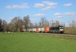 WLC 193 601 mit einem Containerwagenzug Richtung Fulda, am 05.04.2023 in Hauneck.