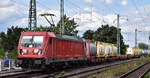 DB Cargo AG [D] mit ihrer  187 151  [NVR-Nummer: 91 80 6187 151-6 D-DB] und einem Containerzug am 19.07.23 Höhe Bahnhof Magdeburg-Neustadt.