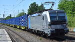 dispo-Tf Rail GmbH, Berlin [D] mit der Railpool Vectron  6193 091  [NVR-Nummer: 91 80 6193 091-6 D-Rpool] und einem Containerzug am 15.05.24 Höhe Bahnhof Saarmund.