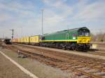 Die frisch hauptuntersuchte PB 02 (Class 66) von Ascendos Rail (geleast von Crossrail)wartet im Germersheimer Bahnhof auf Einfahrt in die Hafenbahn Germersheim, um ihren Containerzug von Antwerpen zum DP-World-Terminal zu bringen. (11.03.2009)