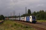 ES 64 U2-019 mit einem Containerzug in Hamburg-Unterelbe am 26.07.2011