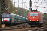 185 595-6  Ruth  fhrt mit einem Containerzug aus Belgien nach Italien ber Kln bei der Ausfahrt von Aachen-West und fhrt in Richtung Kln am 23.4.2012.