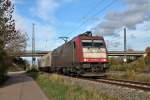 Einfahrt von Crossrail 185 593-1 mit einem Conatinerzug am 09.11.2013 in Mllheim (Baden), als sie von einem ICE berholt wurde.