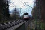 Nachschuß auf den Kastelzug, der von der 189 102 von MRCE aus dem Bahnhof Dülken in den eingleisigen Abschnitt der Strecke Viersen - Venlo einfährt.23.3.2014
