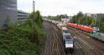 185 571-7 von MRCE fährt mit einem langen Containerzug aus Antwerpen-Oorderen(B) nach Gallarate(I) bei der Ausfahrt von Aachen-West und fährt in Richtung Aachen-Hbf,Köln.