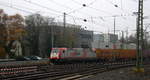 185 591-5 von Crossrail kommt aus Richtung Köln,Aachen-Hbf,Aachen-Schanz  mit einem Containerzug aus Gallarate(I) nach Zeebrugge(B)  und fährt in Aachen-West ein.