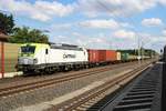 193 896-8 Captrain als Containerzug durchfährt den Bahnhof Radbruch auf der Bahnstrecke Hannover–Hamburg (KBS 110) Richtung Hamburg.