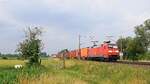 DB Cargo 152 121 mit Containerzug in Richtung Osnabrück, Umleiter (Hüde, 29.06.2021).