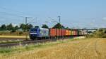 DB Cargo 145 069-1  Starkes Team sucht Kollegen (m/w) , vermietet an RBH Logistics, mit Containerzug in Richtung Osnabrück (Marl, NI, 14.07.2023).