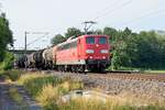 Railpool 151 058, vermietet an DB Cargo, mit gemischtem Güterzug in Richtung Bremen (Hüde, 18.07.19).