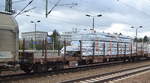 Österreichischer Drehgestell-Flachwagen  vom Einsteller Rail Cargo Wagon - Austria GmbH mit der Nr.
