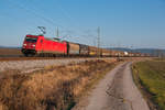 185 245 mit einem gemischten Güterzug bei Mitteldachstetten Richtung Würzburg, 24.01.2020