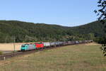 185 615 & 1116 xxx waren am 7. August 2022 mit einem gemischten Güterzug bei Harrbach in Richtung Würzburg unterwegs.