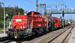 DB Cargo AG, Mainz mit ihrer  261 019-4  (NVR:  92 80 1261 019-4 D-DB ) und einem gemischten Güterzug am 27.09.23 Durchfahrt Bahnhof Roßlau (Elbe).