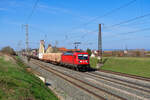 187 165 DB Cargo mit einem gemischten Güterzug bei Herrnberchtheim Richtung Ansbach, 31.03.2021