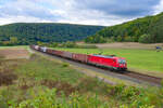 187 174 DB Cargo mit einem gemischten Güterzug bei Harrbach Richtung Würzburg, 07.10.2021