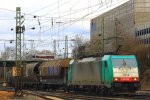 Die Cobra 2814 kommt aus Richtung Kln,Aachen-Hbf mit einem langen gemischten Gterzug aus Kln-Gremberg nach Antwerpen-Noord(B) und fhrt in Aachen-West ein bei Regenwolken am Abend des 11.4.2013.