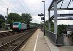 Die Cobra 2811 kommt als Umleiter aus Richtung Aachen-West mit einem Kurzen gemischten Güterzug aus Antwerpen-Noord(B) nach Köln-Gremberg und fährt in Richtung Herzogenrath,Neuss. 
Aufgenommen bei der Durchfahrt in Kohlscheid. 
Bei Sonne und Regenwolken am Mittag vom 30.7.2015.
