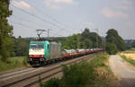 186 123 von Railtraxx kommt aus Richtung Aachen-West und fährt die Gemmenicher-Rampe hoch mit einem Güterzug aus Aachen-West nach Belgien und fährt in Richtung Montzen/Belgien.