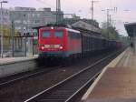 BR 140 497-9 mit Gterzug durchfhrt Unna am 27.10.2004.