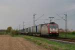 Crossrail 185 600-4 mit einem LKW-Walterzug in Neuss-Allerheiligen am 19.04.2012