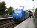 185 515-4 von Railtraxx  kommt aus Richtung Aachen-West auf dem falschen Gleis mit einem langen Coilzug aus Antwerpen-Waaslandhaven(B) nach Linz-Voestalpine(A) und fährt durch Aachen-Schanz in