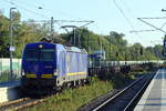 BRCE/DISPO 193 853 kommt mit einem kurzen Zug bestehend aus Flachwagen durch Herten-Westerholt gefahren 25.9.2026  