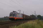 Hectorrail 242.516  Ferdinand  mit einem Schiebewandwagenzug in Reindorf am 04.08.2011