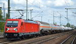 DB Cargo Deutschland AG mit  187 152  [NVR-Number: 91 80 6187 152-4 D-DB] pausiert mit einem gemischten Kesselwagenzug einige Zeit im Bf. Flughafen Berlin-Schönefeld.