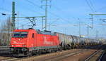 RheinCargo GmbH & Co. KG mit  185 606-1  [NVR-Number: 91 80 6185 606-1 D-RHC] und Kesselwagenzug am 30.01.19 Bf. Flughafen Berlin-Schönefeld.