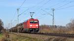 DB Cargo 185 353 mit Kesselwagenzug EZ 50760 Barenburg - Lingen-Holthausen (Diepholz-Graftlage, 25.02.19).