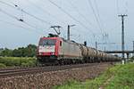 Am Nachmittag des 08.06.2018 fuhr BRLL/HSL 185 593-1 mit einem Kesselwagenzug durch die Gleisanlagen von Müllheim (Baden) in Richtung Freiburg (Breisgau).