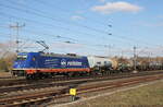 Raildox 185 409-0 mit Kessel- und Silowagen Richtung Eisenach, am 28.02.2023 in Neudietendorf.