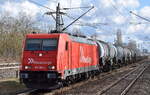 RheinCargo GmbH & Co. KG, Neuss [D] mit der  185 604-6  [NVR-Nummer: 91 80 6185 604-6 D-RHC] und einem Kesselwagenzug (leer) Richtung Stendell am 15.03.23 Durchfahrt Bahnhof Berlin-Hohenschönhausen.