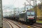 187 105 Beacon mit Kesselzug in Hamburg Harburg, April 2026.