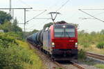 RCM 193 082 kommt mit einem Zug aus Kesselwagen durch Herten-Westerholt gefahren 27.8.2026