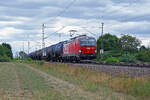 Mit einem Kesselwagenzug am Haken rollte 1293 157 der �BB  am 30.08.26 durch Gr�fenhainichen Richtung Wittenberg.