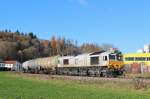 Am 25.November 2013 war ECR 247 046 mit einem Kesselwagenzug in Tüßling auf dem Weg Richtung Burghausen.