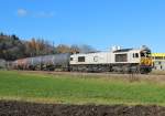 Am 25.November 2013 war ECR 247 058 mit einem Kesselwagenzug in Tüßling auf dem Weg Richtung Burghausen.