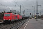 RHC 2053 (185 585-7) am 17.01.2015 mit einem Kesselwagnezug und der kalt mitlaufenden RHC 2056 (185 588-1) bei der Durchfahrt in Müllheim (Baden) gen Freiburg.