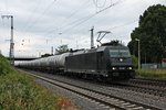Mit einem Kesselwagenzug von GATX fuhr die 185 569-1 von MRCE/SBB Cargo International am 09.06.2015 durch die Bahnanlagen von Müllheim (Baden) in Richtung Schweizer Grenze.