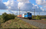 Containerzug mit 140 837-6 (140 046-0) unterwegs bei Ovelgünne Richtung Magdeburg-Sudenburg.