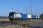 370 016 der PKP Cargo führte am 06.03.26 einen blau-weißen Containerzug durch Wittenberg-Labetz Richtung Dessau.
