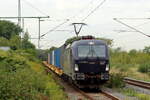 CargoUnit 5370 038-9 kommt mit einem schwach ausgelasteten Containerzug durch Herten-Westerholt gefahren 26.9.2026