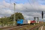ATLU 185 518-8 mit einem Container-KLV Richtung Magdeburg Hbf, am 19.10.2026 in Magdeburg-Neustadt.