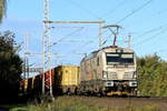 Budamar 383 211-0 kommt mit einem Containerzug am Fotopunkt in Dedensen-G�mmer vorbei 22.10.2026