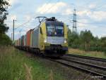 Die an die TX Logistik vermietete ES 64 U2-010 bef�rdert am 26.08.09 einen Containerzug aus Hamburg-Waltershof durch Hamburg-Moorburg Richtung Maschen.
