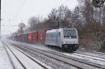 Heureka – meine erste RAILPOOL-185 kam! Die 185 671-5 die als Leihlok bei der EVB f�hrt,kam mit ihrem langen EVB-Containerzug am 09.01.2010 durch den S-Bahnhof Dedensen/G�mmer.