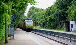 145 CL-031 von Alpha Trains kommt durch Aachen-Eilendorf mit einem Containerzug aus Aachen-West und f�hrt in Richtung K�ln bei Sommerwetter mit Wolken am 21.6.2012.