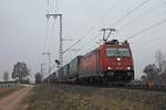Am 21.12.2016 fuhr BRLL/XRAIL 185 595-6  Ruth  mit ihrem  LKW Walter -KLV aus Belgien, den sie in Aachen West übernommen hatte, bei Müllheim (Baden) auf der KBS 703 in Richtung Schweiz.